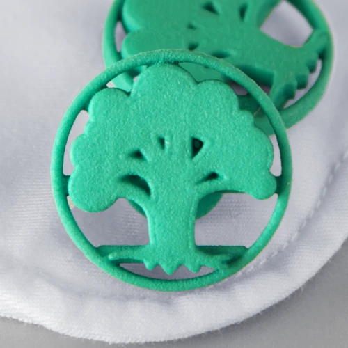 Product photography of 3D printed Cuff links (tree motif in green). Post production included:

- Colour and tone alterations
- Focus stacking multiple images for deeper depth-of-field
- Minor image retouching

Client: WhatNick INC